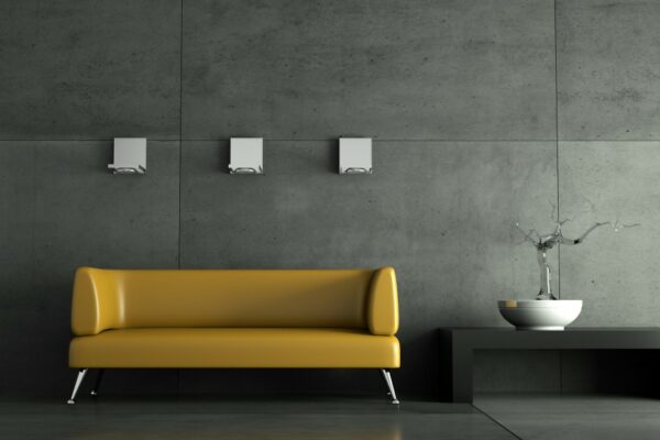 3d Rendering gelbes Ledersofa vor Betonwand 3d Rendering gelbes Ledersofa vor Betonwand